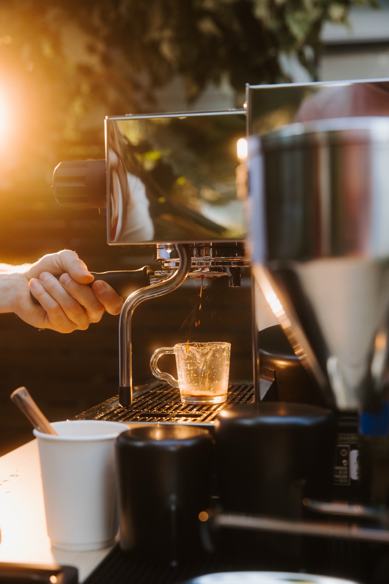 Espresso pulling from a machine — sensory product content by Orange Grove Social