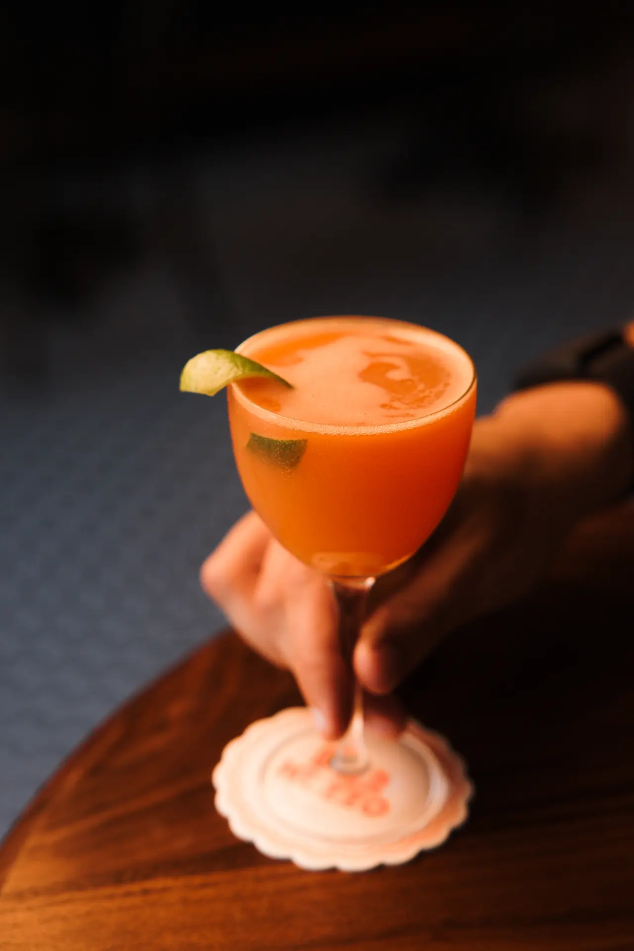 Orange coupe cocktail served at Bar Mezzo, photographed by Orange Grove Social