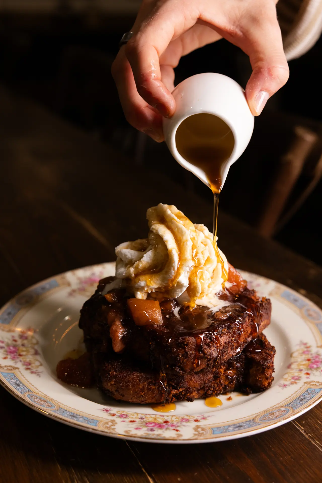 Caramel poured over dessert at The Tides Market, photographed by Orange Grove Social